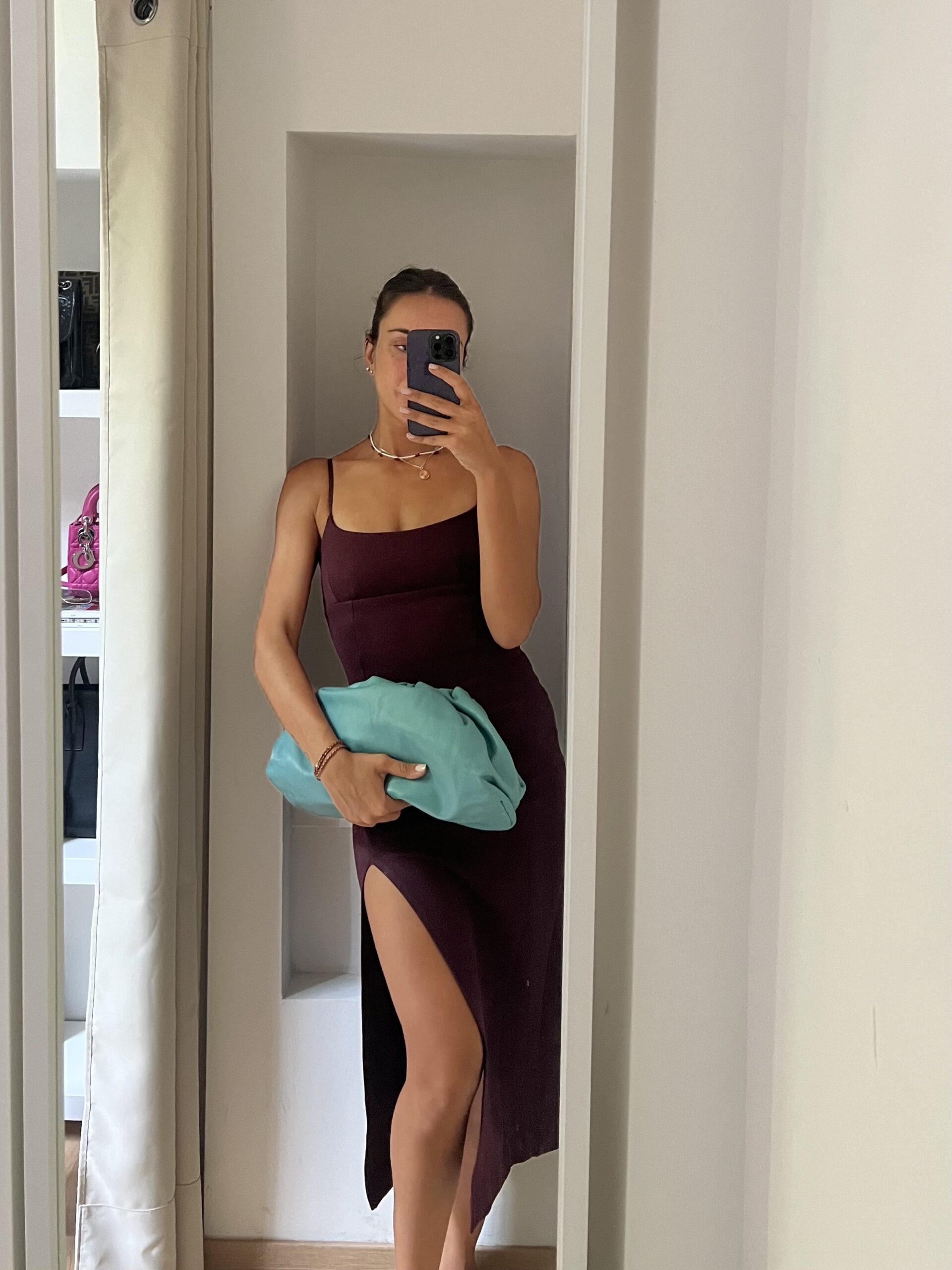POUCH A MANO IN PELLE BOTTEGA VENETA