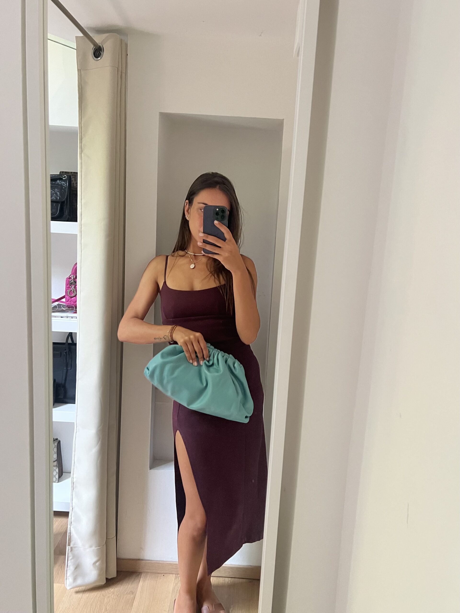 POUCH A MANO IN PELLE BOTTEGA VENETA