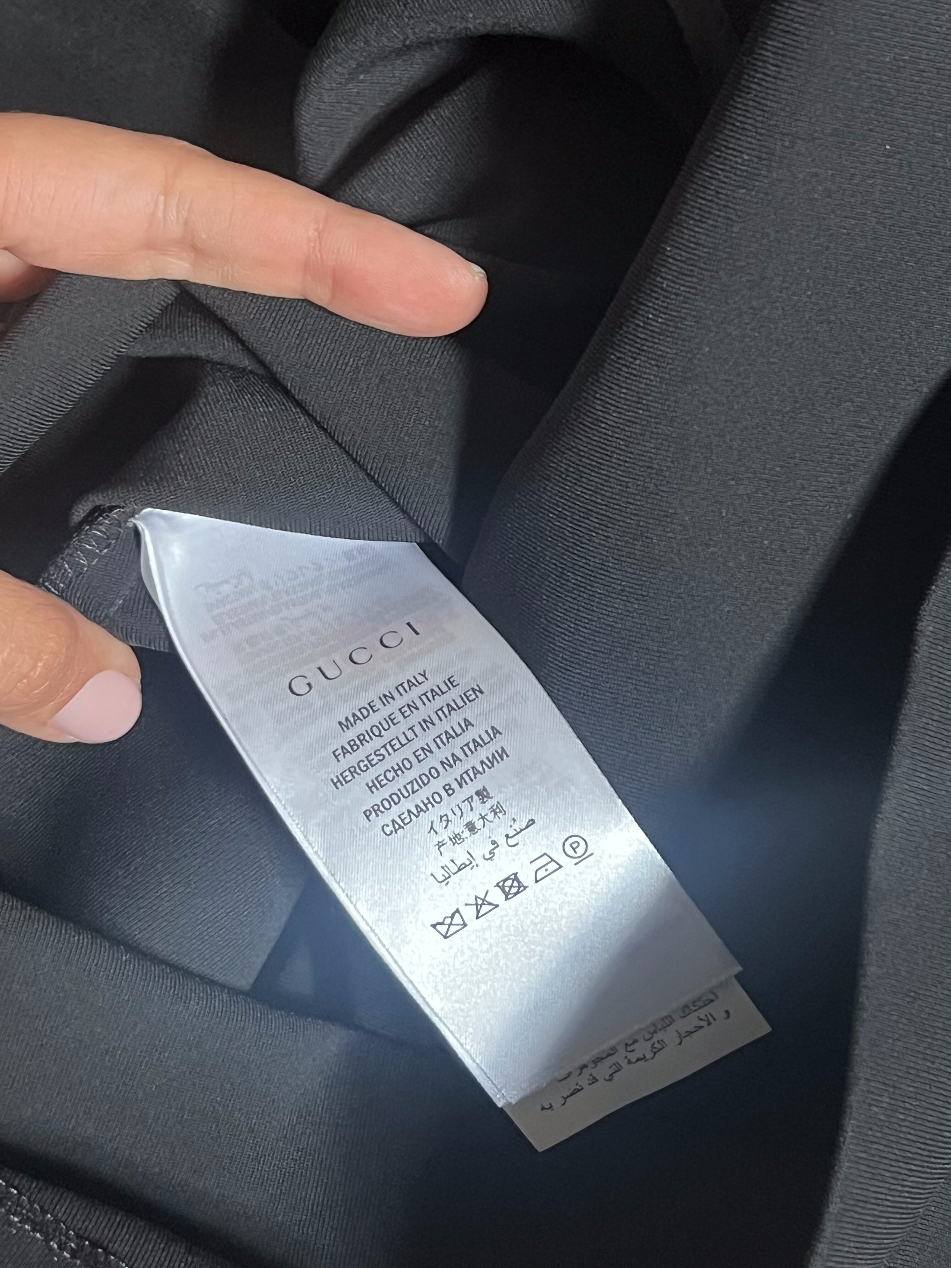 ABITO NERO PROFILI WEB GUCCI